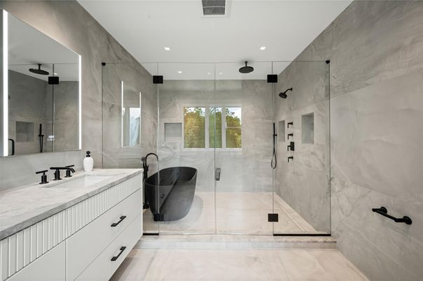 Bathroom, Dual Sink Vanities, Glass Shower, Interior, Marble, Marble Walls, Recessed Lighting