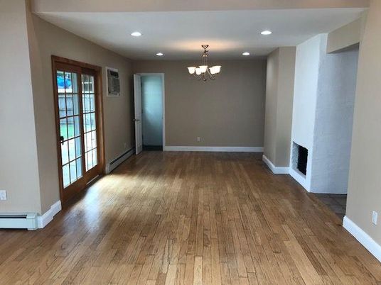 Chandelier, Empty room, Fireplace, Interior, Recessed Lighting, Wood Texture Flooring
