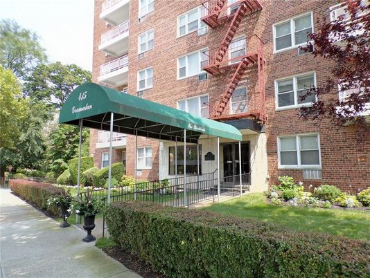 Exterior, Facade, Brick Facade, Condo Building