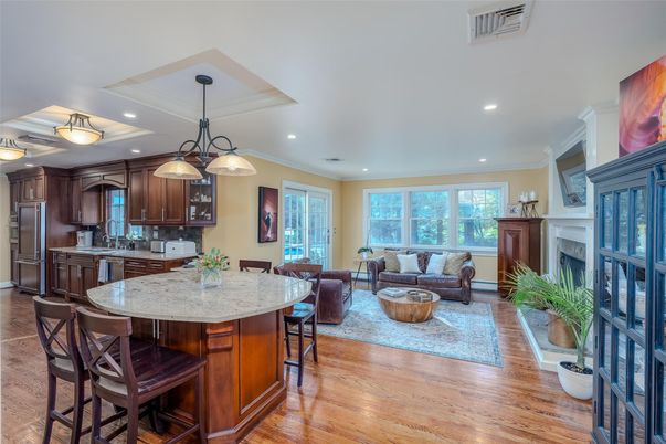 Dining room, Fireplace, Interior, Kitchen, Living room, Pendant Lights, Recessed Lighting, Stainless Steel Appliances, Wood Texture Flooring