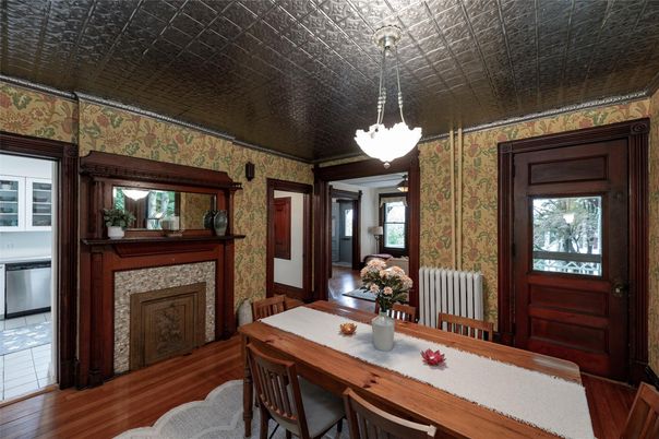 Dining room, Fireplace, Interior, Pendant Lights, Wood Texture Flooring