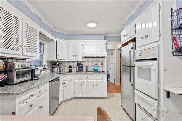Interior, Kitchen, Recessed Lighting, Stainless Steel Appliances, Wood Texture Flooring
