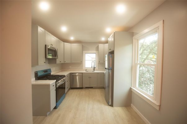 Interior, Kitchen, Recessed Lighting, Stainless Steel Appliances, Wood Texture Flooring