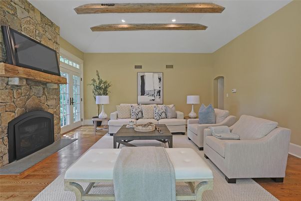 Fireplace, Interior, Living room, Recessed Lighting, Stone Walls, Wooden Beams, Wood Texture Flooring