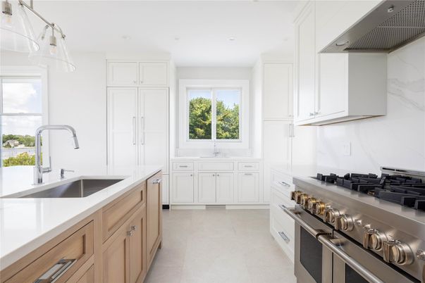 Interior, Kitchen, Marble Walls, Recessed Lighting, Stainless Steel Appliances