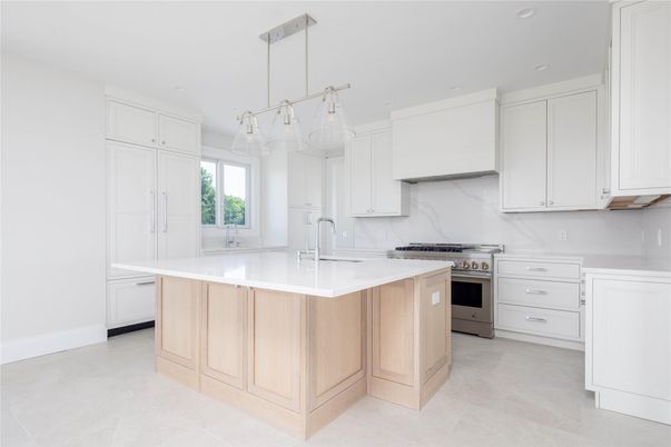Interior, Kitchen, Marble Walls, Pendant Lights, Recessed Lighting, Stainless Steel Appliances