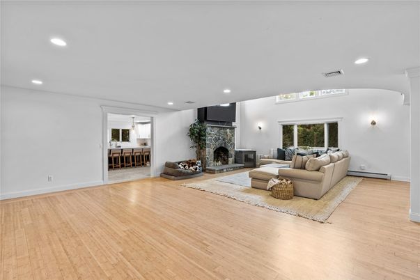 Dining room, Fireplace, Interior, Living room, Recessed Lighting, Wood Texture Flooring
