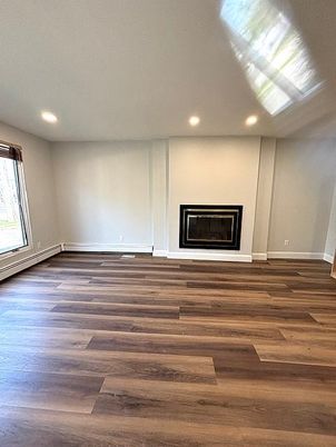 Empty room, Fireplace, Interior, Recessed Lighting, Wood Texture Flooring