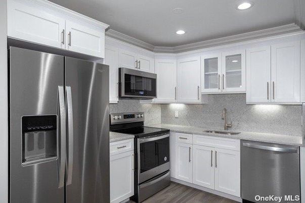 Interior, Kitchen, Recessed Lighting, Stainless Steel Appliances, Wood Texture Flooring