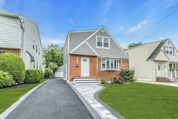 Exterior, Facade, Brick Facade, Cape Cod