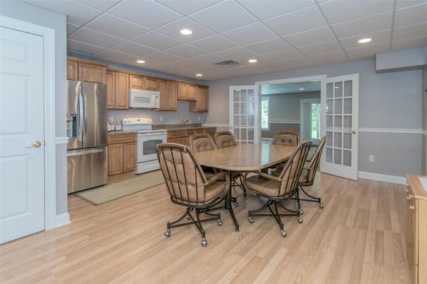 Dining room, Interior, Kitchen, Recessed Lighting, Stainless Steel Appliances, Wood Texture Flooring