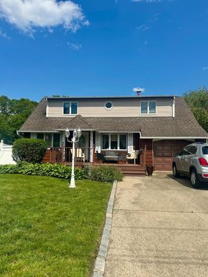 Attached, Exterior, Facade, Raised Ranch