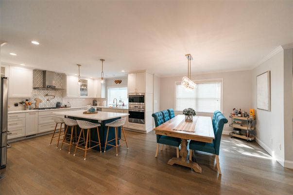 Dining room, Interior, Kitchen, Pendant Lights, Recessed Lighting, Stainless Steel Appliances, Wood Texture Flooring