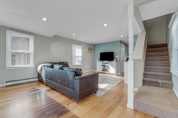Fireplace, Interior, Living room, Recessed Lighting, Wood Texture Flooring