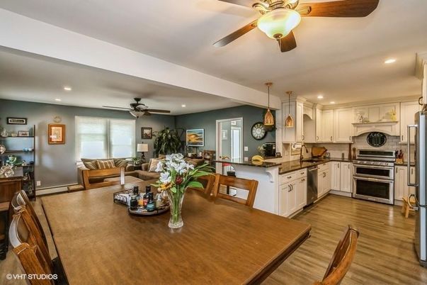 Dining room, Interior, Kitchen, Living room, Pendant Lights, Recessed Lighting, Stainless Steel Appliances, Wood Texture Flooring