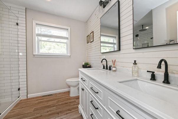 Bathroom, Dual Sink Vanities, Glass Shower, Interior, Recessed Lighting, Wood Texture Flooring