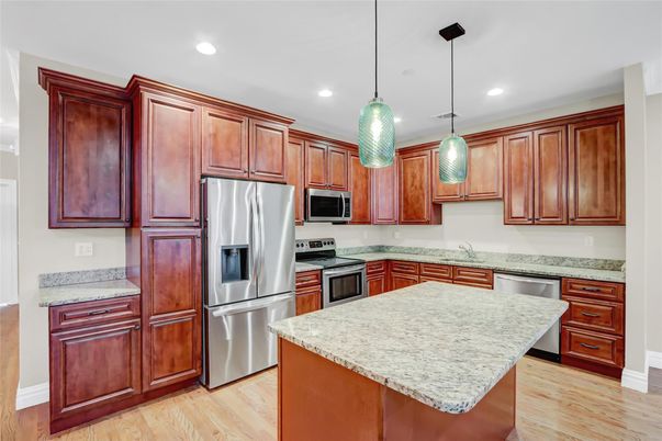 Interior, Kitchen, Pendant Lights, Recessed Lighting, Stainless Steel Appliances, Wood Texture Flooring