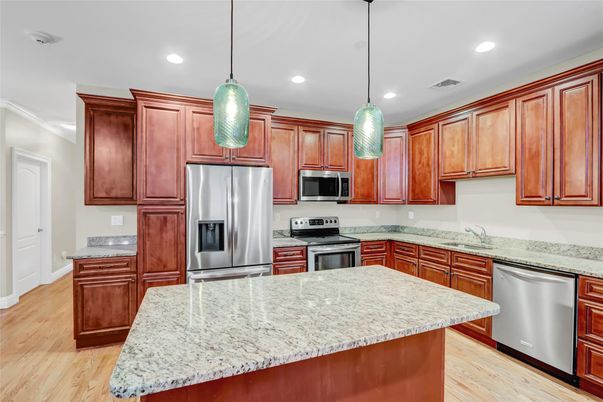 Interior, Kitchen, Pendant Lights, Recessed Lighting, Stainless Steel Appliances, Wood Texture Flooring