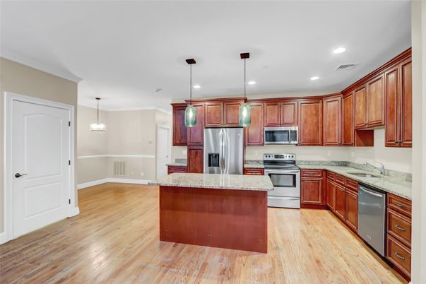 Interior, Kitchen, Pendant Lights, Recessed Lighting, Stainless Steel Appliances, Wood Texture Flooring