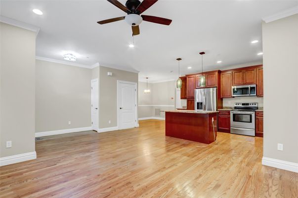 Interior, Kitchen, Pendant Lights, Recessed Lighting, Stainless Steel Appliances, Wood Texture Flooring