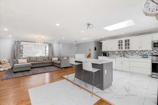 Interior, Kitchen, Living room, Marble, Pendant Lights, Recessed Lighting, Stainless Steel Appliances, Wood Texture Flooring
