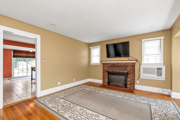 Empty room, Fireplace, Interior, Recessed Lighting, Wood Texture Flooring