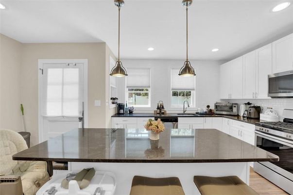 Interior, Kitchen, Pendant Lights, Recessed Lighting, Stainless Steel Appliances, Wood Texture Flooring