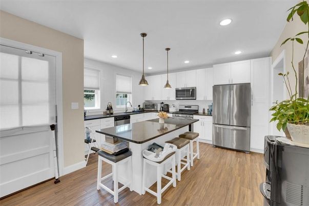 Interior, Kitchen, Pendant Lights, Recessed Lighting, Stainless Steel Appliances, Wood Texture Flooring