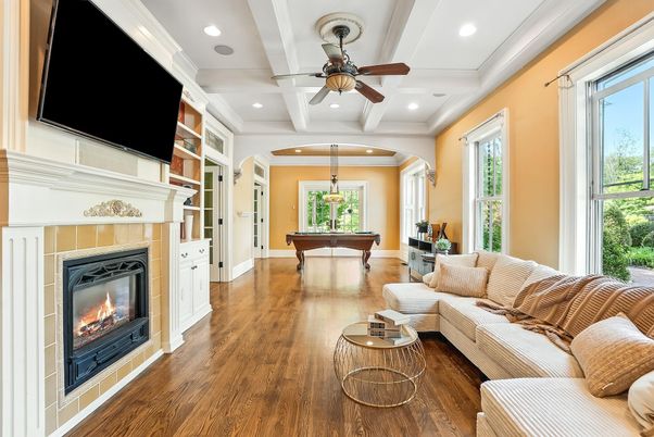 Billiard Table, Fireplace, Game Room, Interior, Living room, Pendant Lights, Recessed Lighting, Wood Texture Flooring