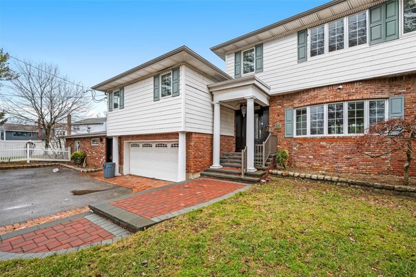 Attached, Exterior, Facade, Brick Facade, Raised Ranch