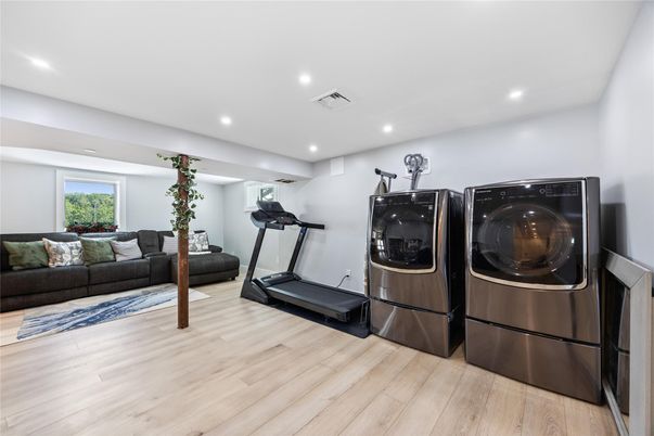 Fitness Equipment, Interior, Recessed Lighting, Washer, Wood Texture Flooring