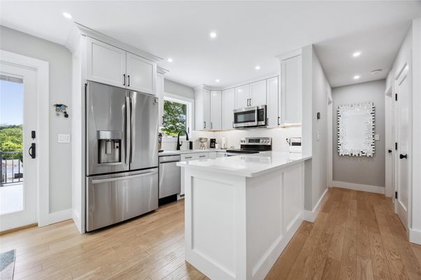 Interior, Kitchen, Recessed Lighting, Stainless Steel Appliances, Wood Texture Flooring