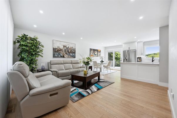 Dining room, Interior, Kitchen, Living room, Recessed Lighting, Stainless Steel Appliances, Wood Texture Flooring