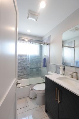Bathroom, Dual Sink Vanities, Glass Shower, Interior, Marble, Recessed Lighting