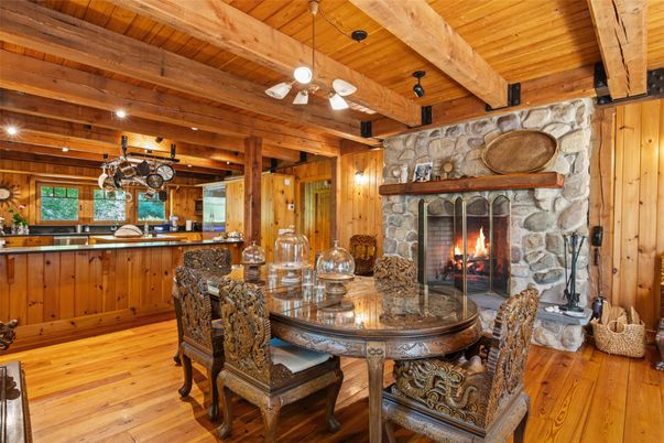 Chandelier, Dining room, Fireplace, Interior, Recessed Lighting, Stone Walls, Wooden Beams, Wooden Ceilings, Wood Texture Flooring, Wooden Walls