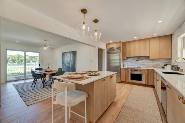 Dining room, Interior, Kitchen, Pendant Lights, Recessed Lighting, Stainless Steel Appliances, Wood Texture Flooring