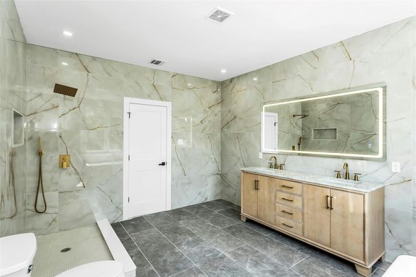Bathroom, Dual Sink Vanities, Glass Shower, Interior, Marble Walls, Recessed Lighting
