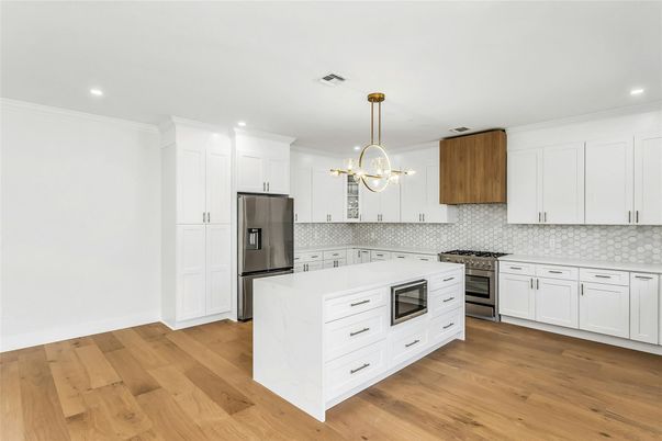 Interior, Kitchen, Pendant Lights, Recessed Lighting, Stainless Steel Appliances, Wood Texture Flooring
