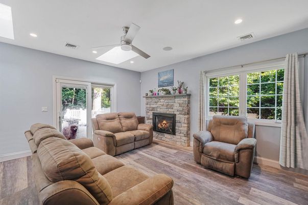 Fireplace, Interior, Living room, Recessed Lighting, Wood Texture Flooring