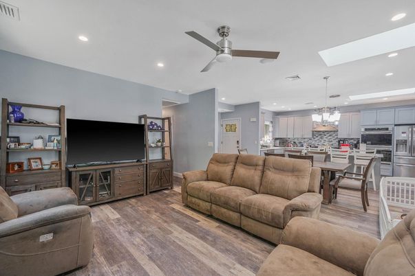 Dining room, Interior, Kitchen, Living room, Pendant Lights, Recessed Lighting, Stainless Steel Appliances, Wood Texture Flooring