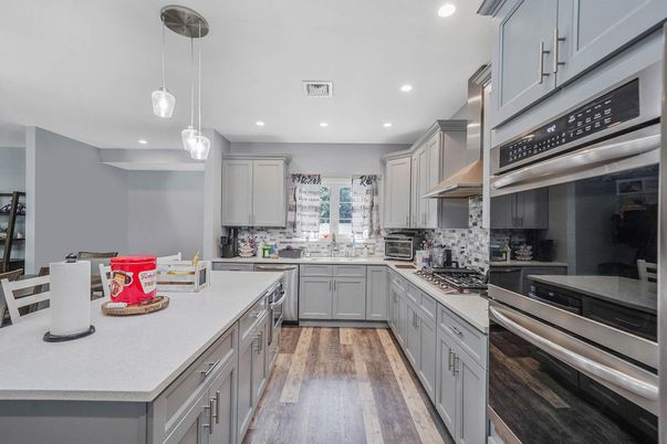 Interior, Kitchen, Pendant Lights, Recessed Lighting, Stainless Steel Appliances, Wood Texture Flooring