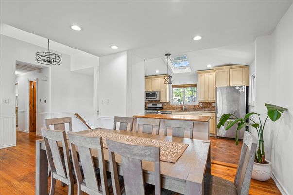 Dining room, Interior, Kitchen, Pendant Lights, Recessed Lighting, Stainless Steel Appliances, Wood Texture Flooring