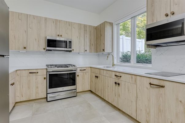 Interior, Kitchen, Marble Walls, Stainless Steel Appliances