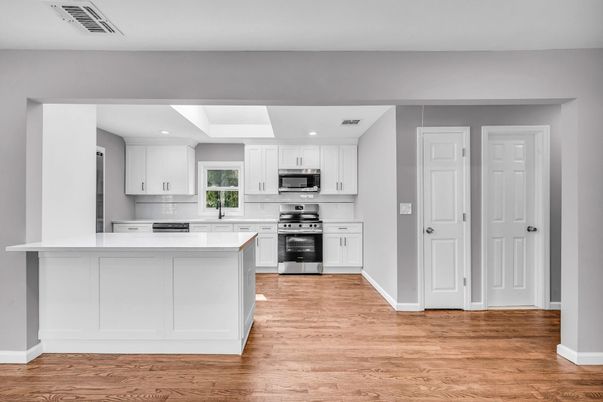 Interior, Kitchen, Recessed Lighting, Stainless Steel Appliances, Wood Texture Flooring
