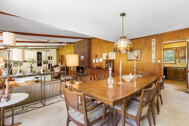 Dining room, Fireplace, Interior, Pendant Lights, Stone Walls, Wood Texture Flooring, Wooden Walls