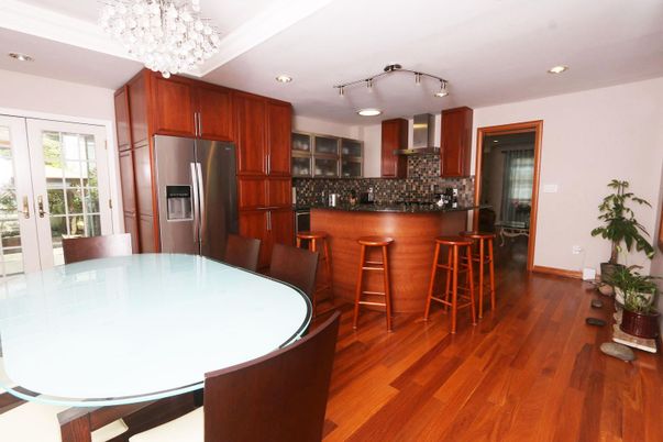 Chandelier, Dining room, Interior, Kitchen, Recessed Lighting, Stainless Steel Appliances, Wood Texture Flooring