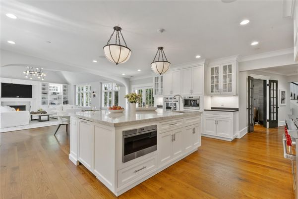 Dining room, Fireplace, Interior, Kitchen, Living room, Pendant Lights, Recessed Lighting, Stainless Steel Appliances, Wood Texture Flooring