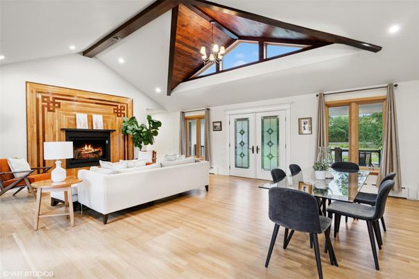 Dining room, Fireplace, Interior, Living room, Recessed Lighting, Wooden Beams, Wood Texture Flooring
