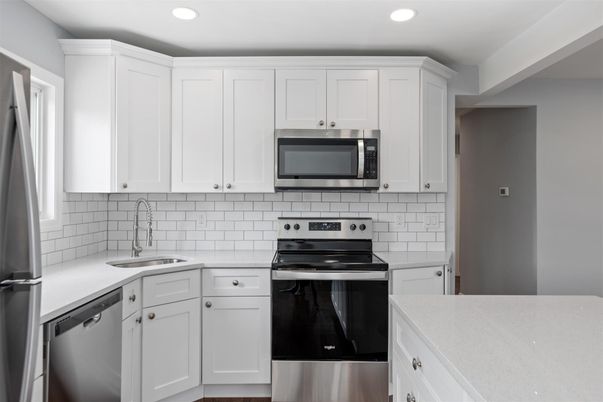 Interior, Kitchen, Recessed Lighting, Stainless Steel Appliances, Wood Texture Flooring