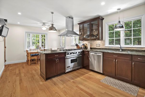Dining room, Interior, Kitchen, Pendant Lights, Recessed Lighting, Stainless Steel Appliances, Wood Texture Flooring